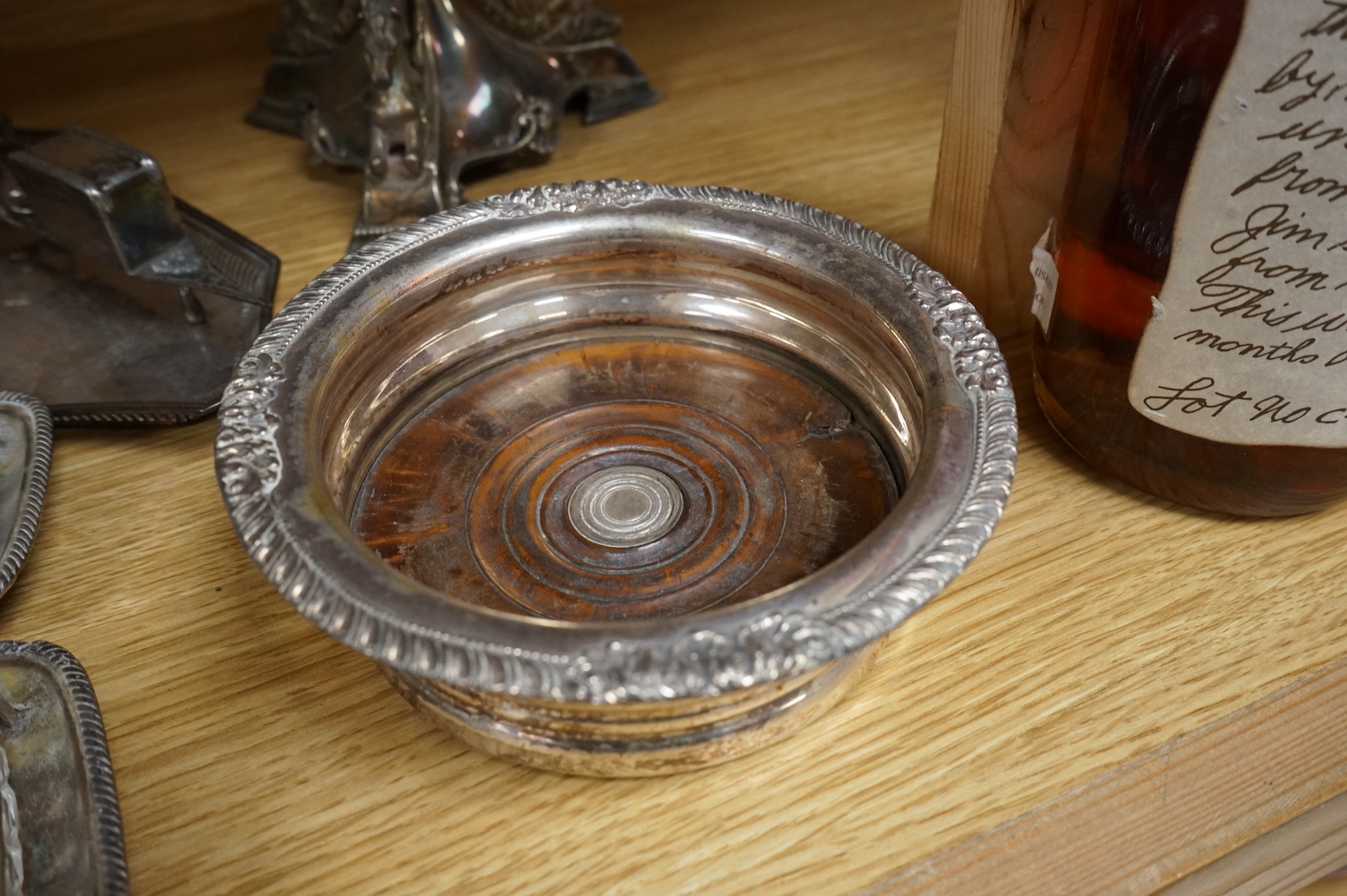 Pair of Victorian plated centerpieces and a small collection of other plated wares to include wine coasters, largest 18cm high